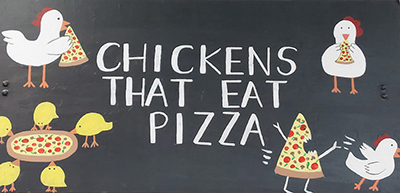 Chickens That Eat Pizza sign