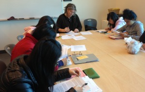 Students working together at a conference table