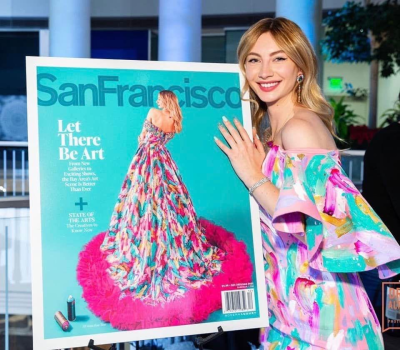 Model holding San Francisco magazine