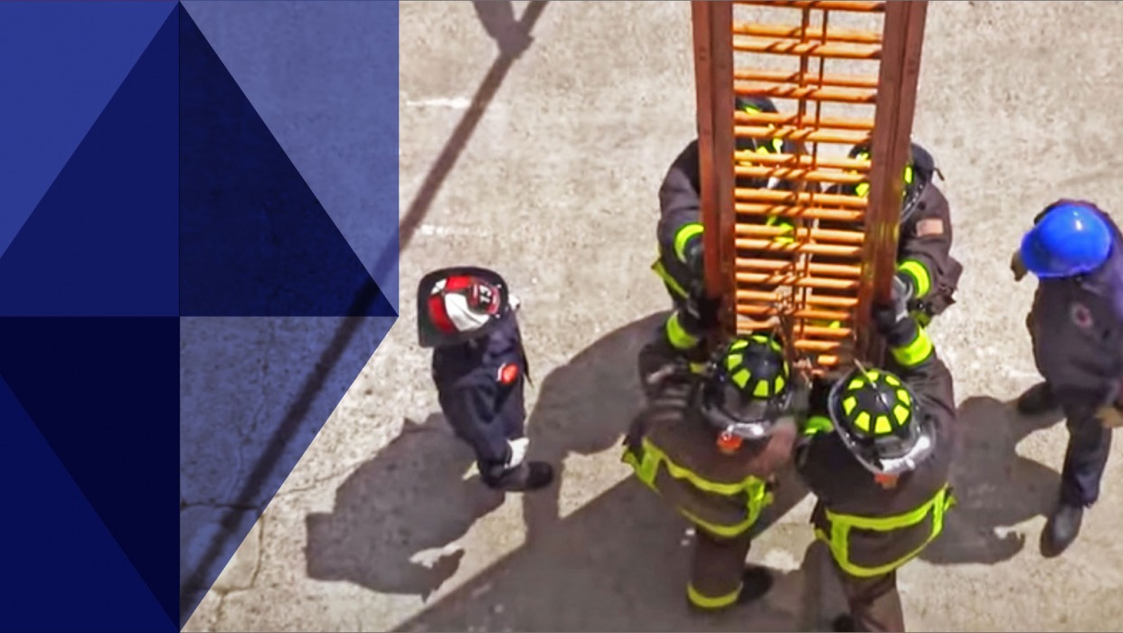 Fire justice students train going up a ladder