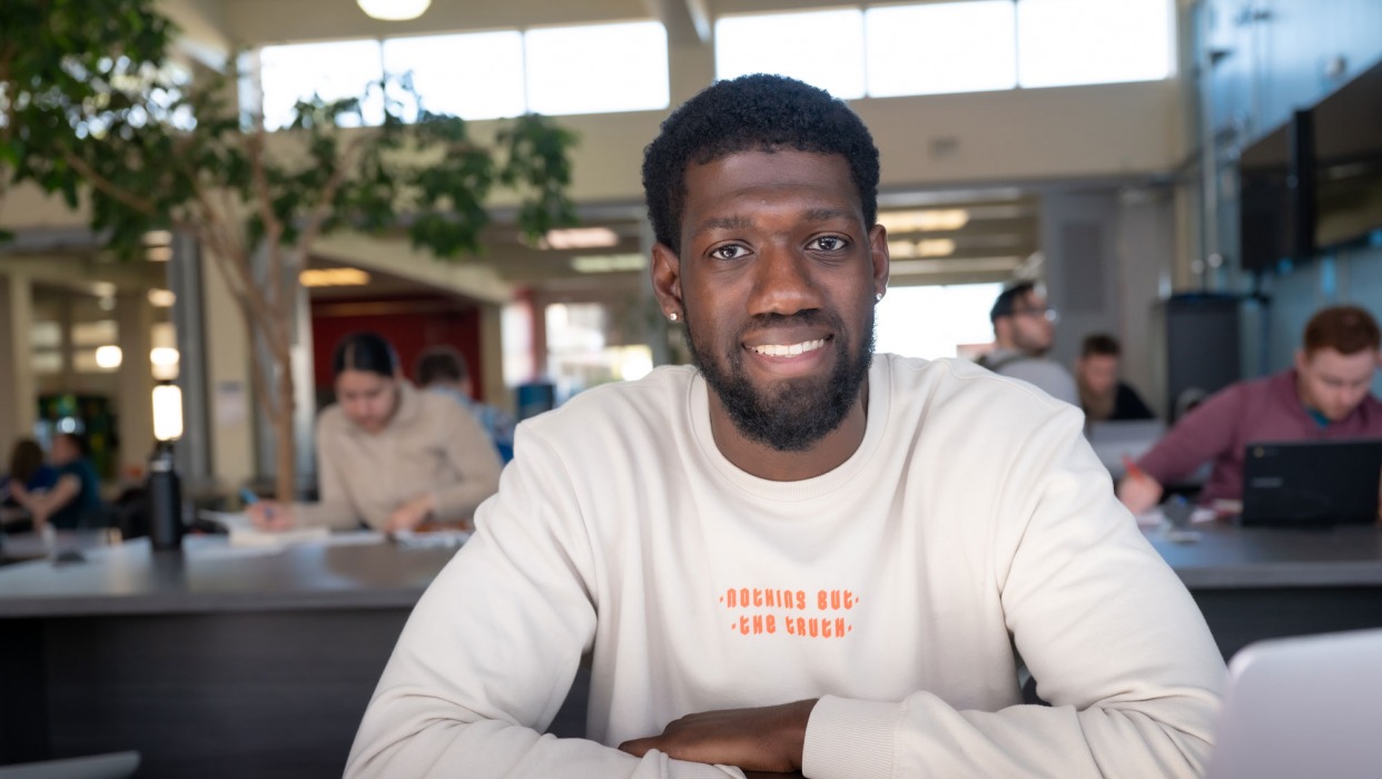 CCSF student studies in common area