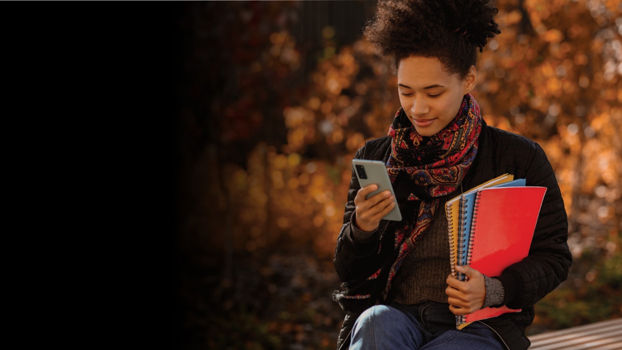 student looking at phone