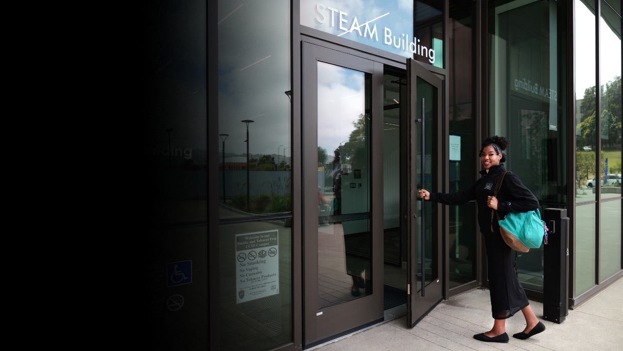 Student entering building