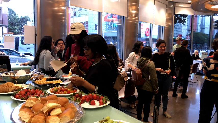 People eating at Fashion Career Fair