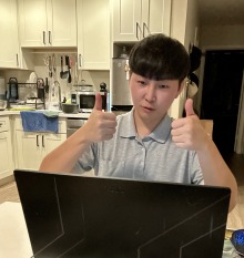 Student sitting in front of a laptop