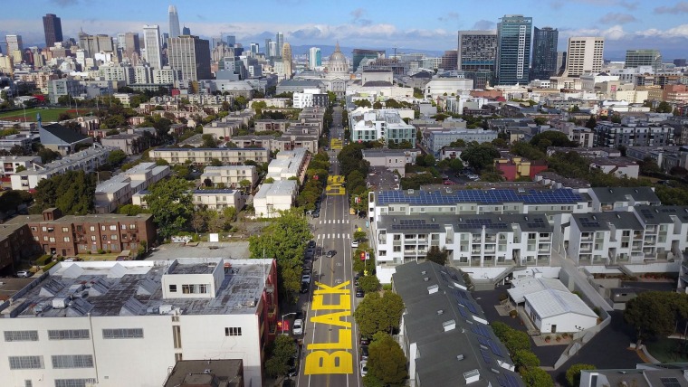 A stretch of roadway leading to San Francisco City Hall has been painted over with a mural that spells out “BLACK LIVES MATTER.”